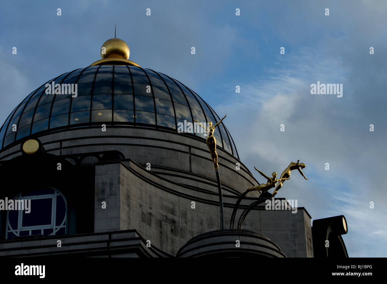 Haymarket, London/UK - May 4 2018: Three Synchronised Divers of Rudy Weller at the Criterion Building & Its Dome. Stock Photo
