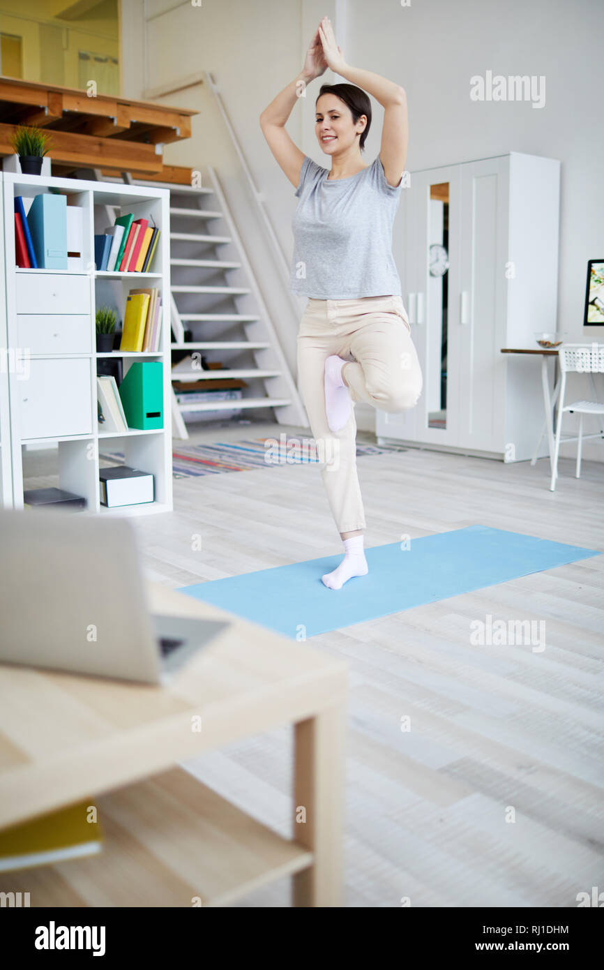 Woman Doing Yoga Stock Photo