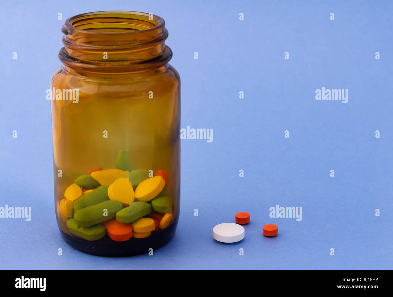 Download Yellow Pills In A Glass High Resolution Stock Photography And Images Alamy PSD Mockup Templates