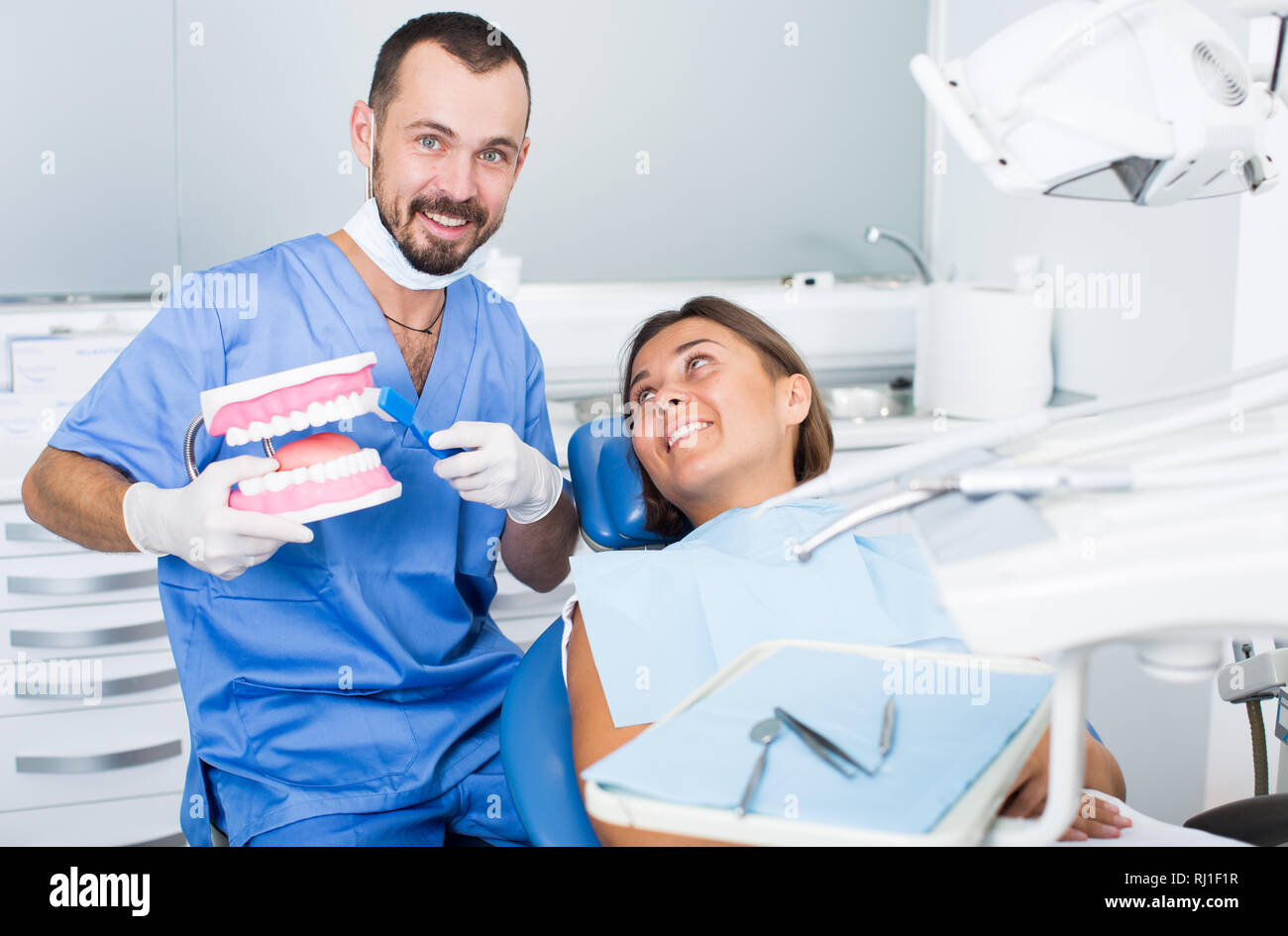 Orthodontist is telling about hygiene in hospital Stock Photo Alamy