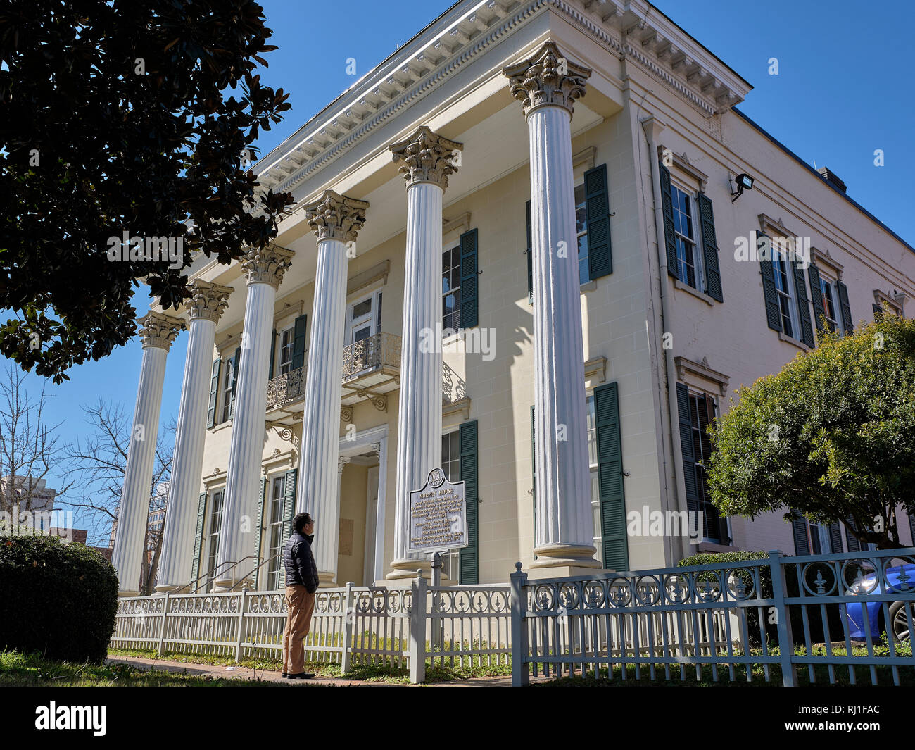 Murphy House, a Greek revival home build in 1851 is visited by a tourist in Montgomery Alabama, USA. Stock Photo