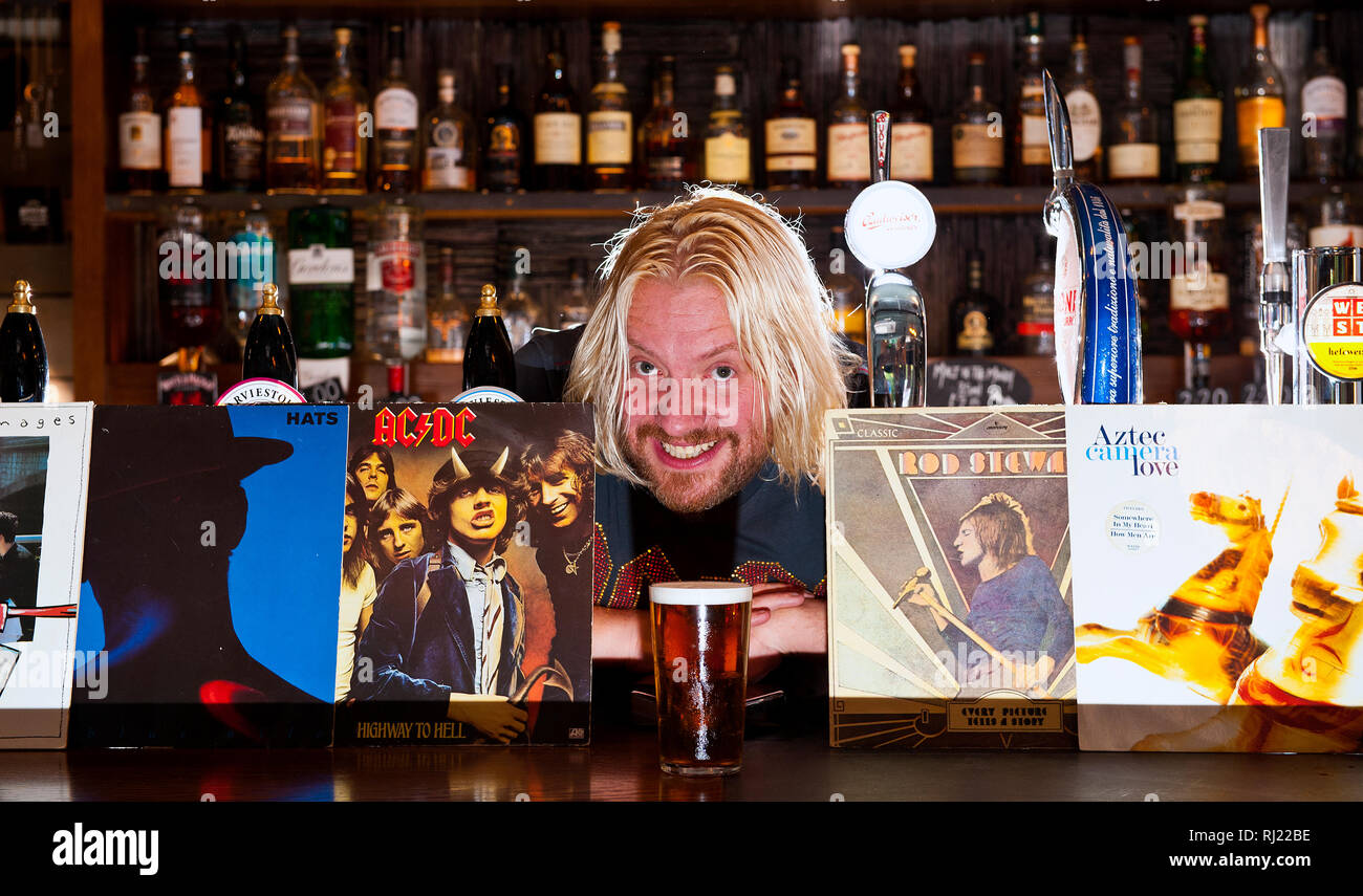 DJ and TV presenter Ewan Macleod and Barmaid Erin McGeough launch a national Scottish music pub quiz at DRAM! in Glasgow's westend to help raise publi Stock Photo