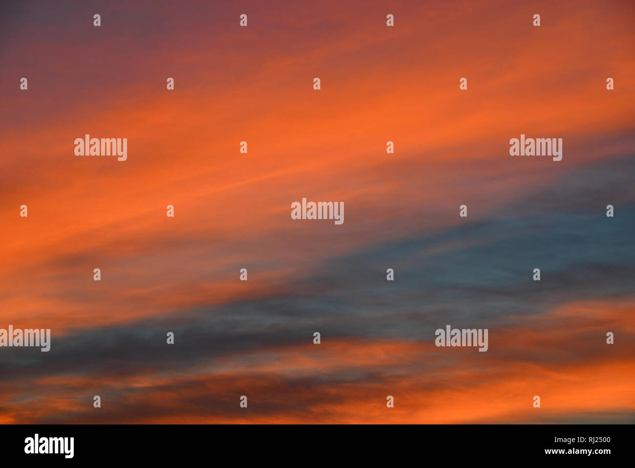 Sunset sky with beautiful colors as background Stock Photo - Alamy