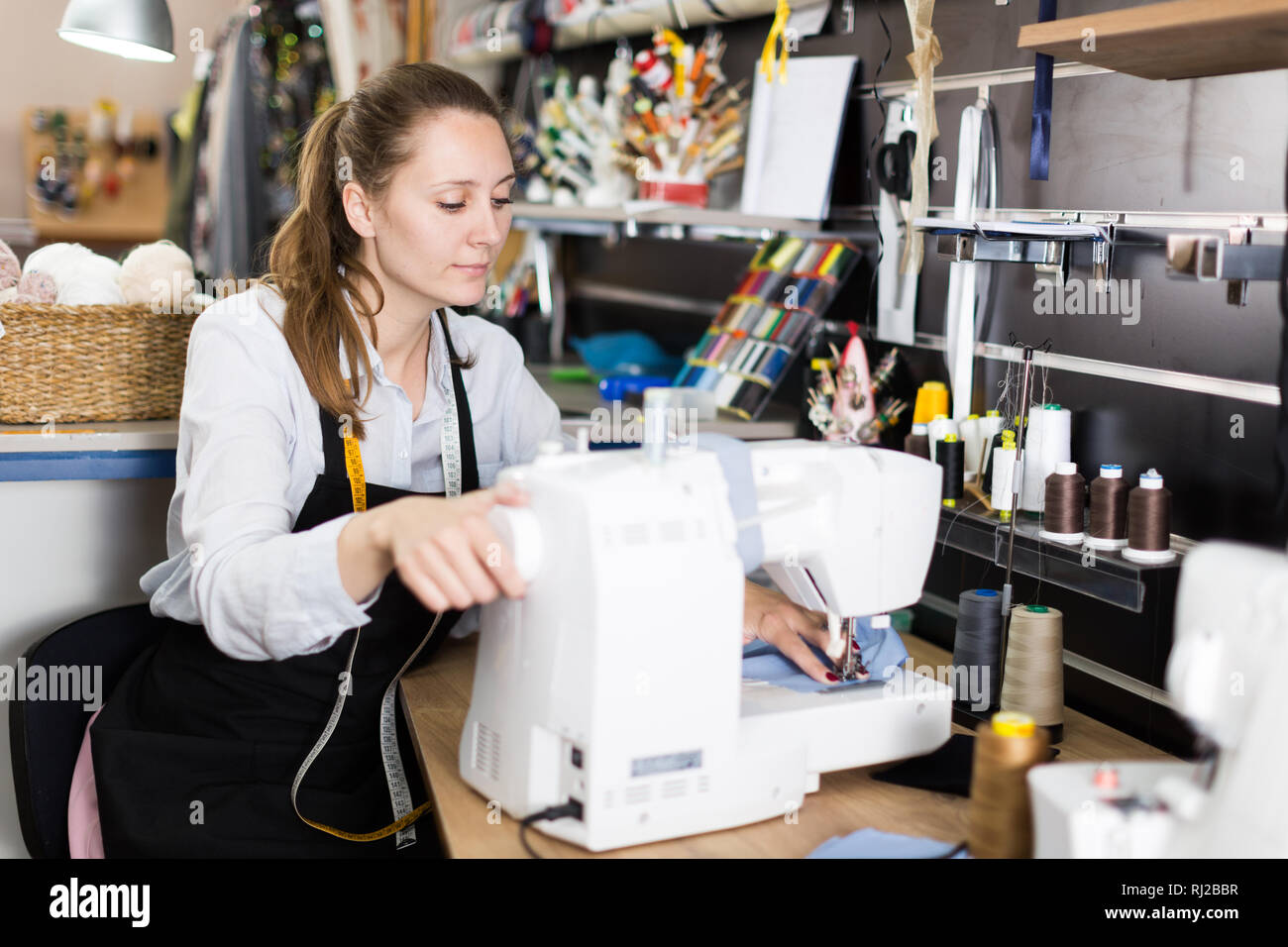 Craftswoman in sewing workshop hi-res stock photography and images - Alamy