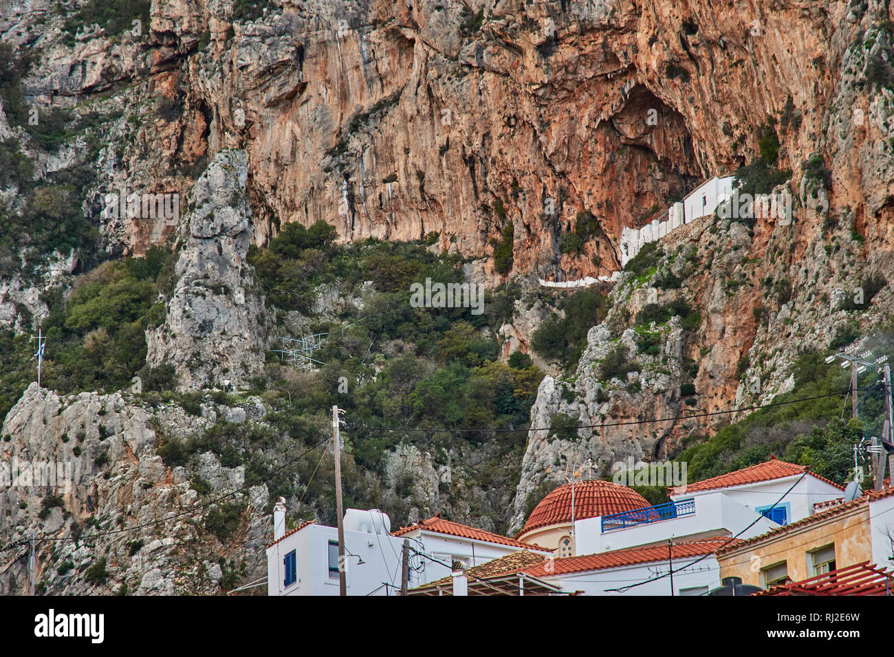 Tele photo view of the Holy Monastery of Zoodochos Pighi. Located over the Historical Byzantine village Velanidia near cape Malea, Greece. Stock Photo