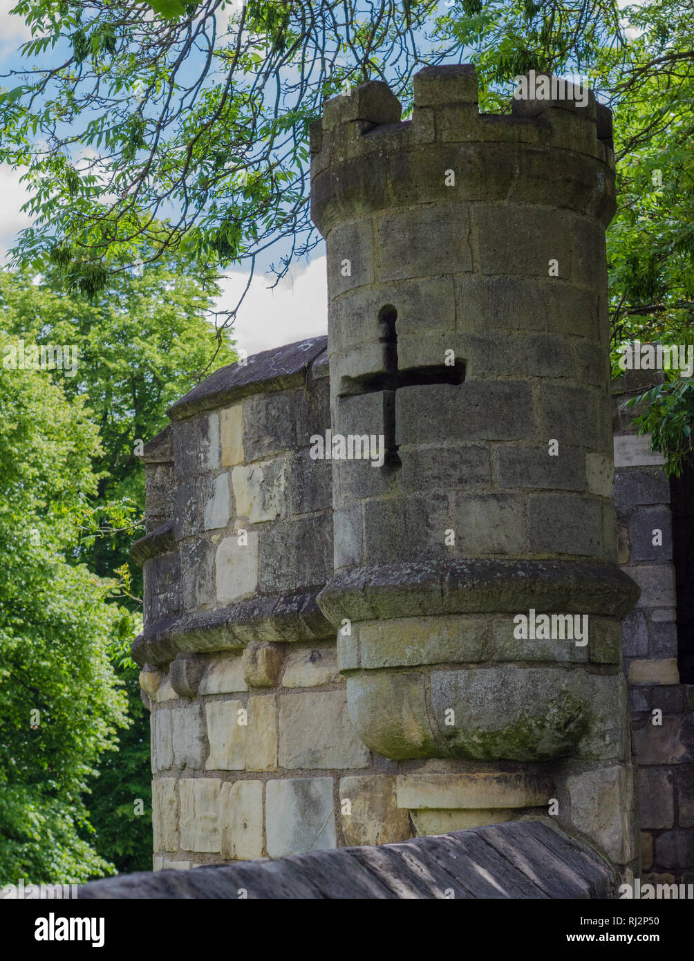 A gatehouse in the walled fortifications in York, England. An arrowslit