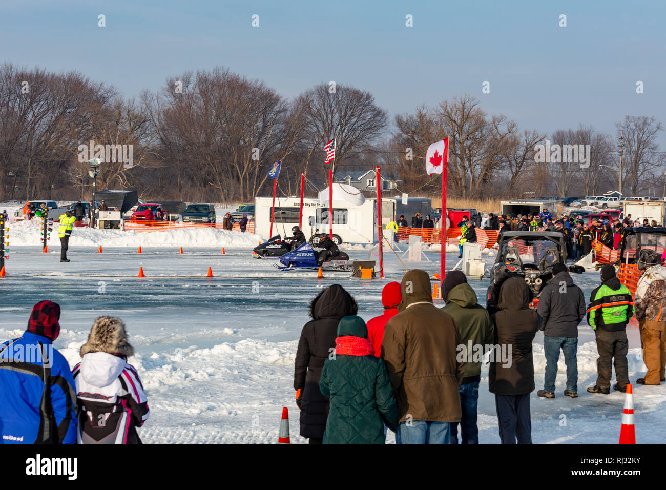 Fair Haven, Michigan Snowmobile drag racing on Anchor Bay of frozen Lake St. Clair Stock Photo