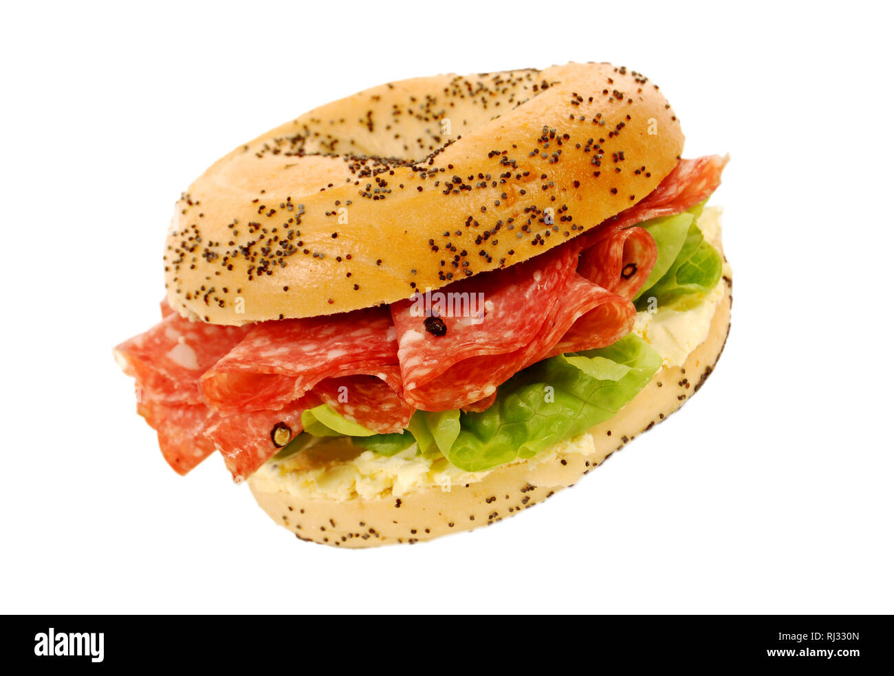Salami ham and cream cheese bagel sandwich on isolated white background