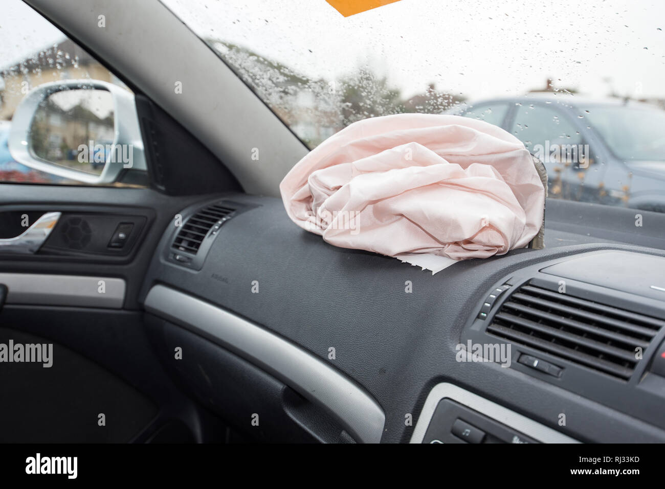 Car Crash; Damage and details, deployed airbag after a vehicle accident