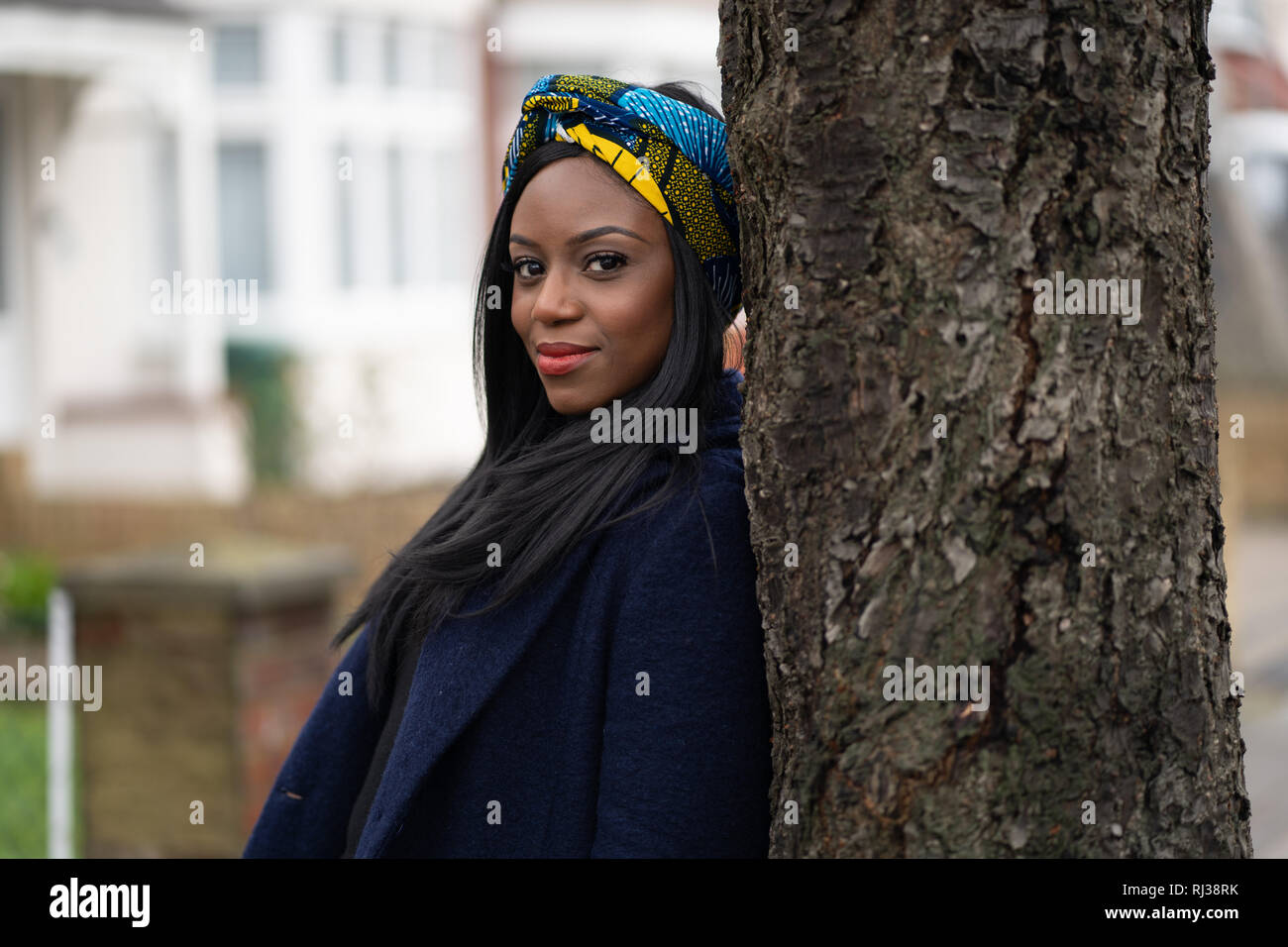 Portrait of a young black woman hi-res stock photography and images - Alamy