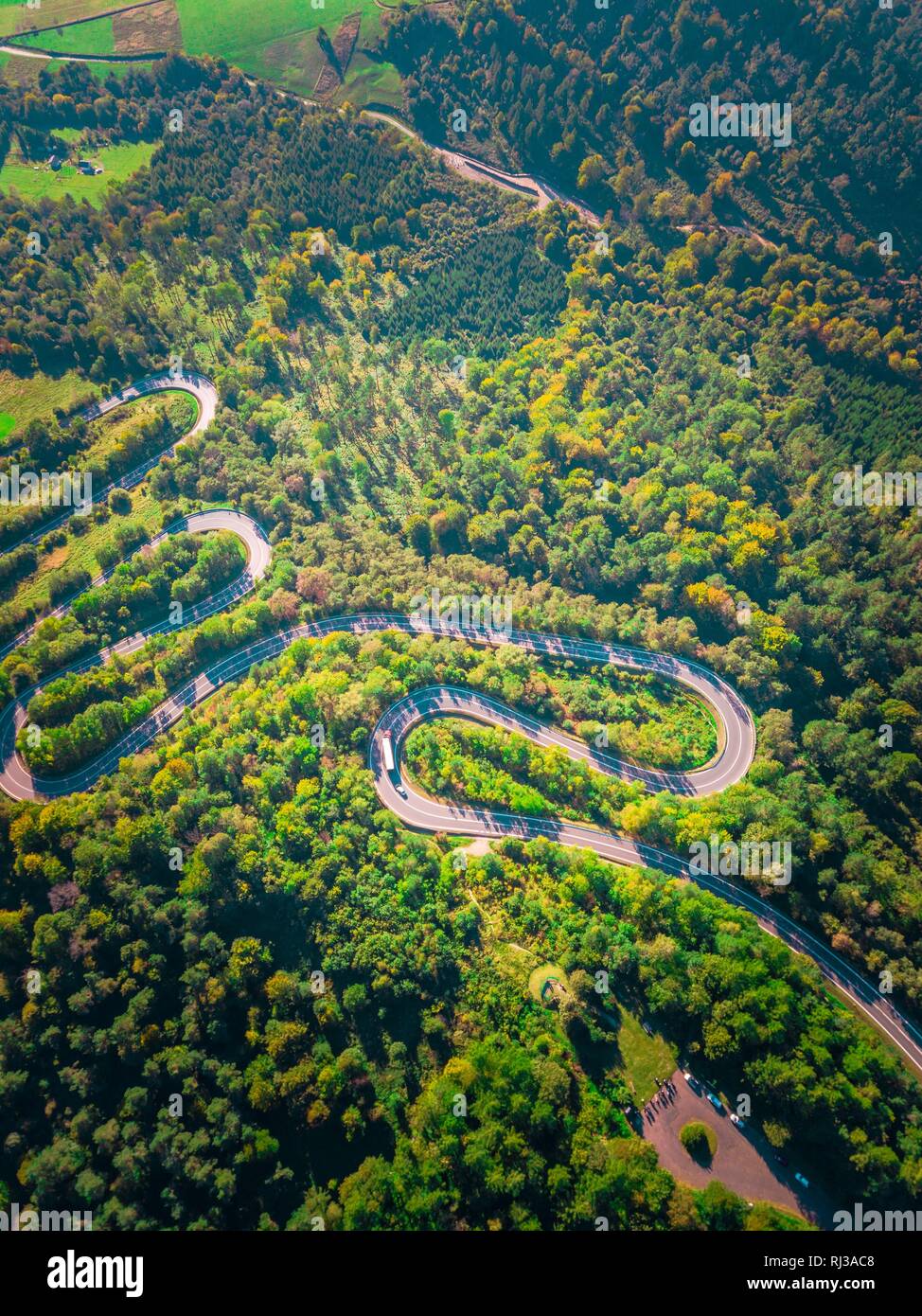 Serpentine road in Bieszczady mountains photographed from drone. Curves