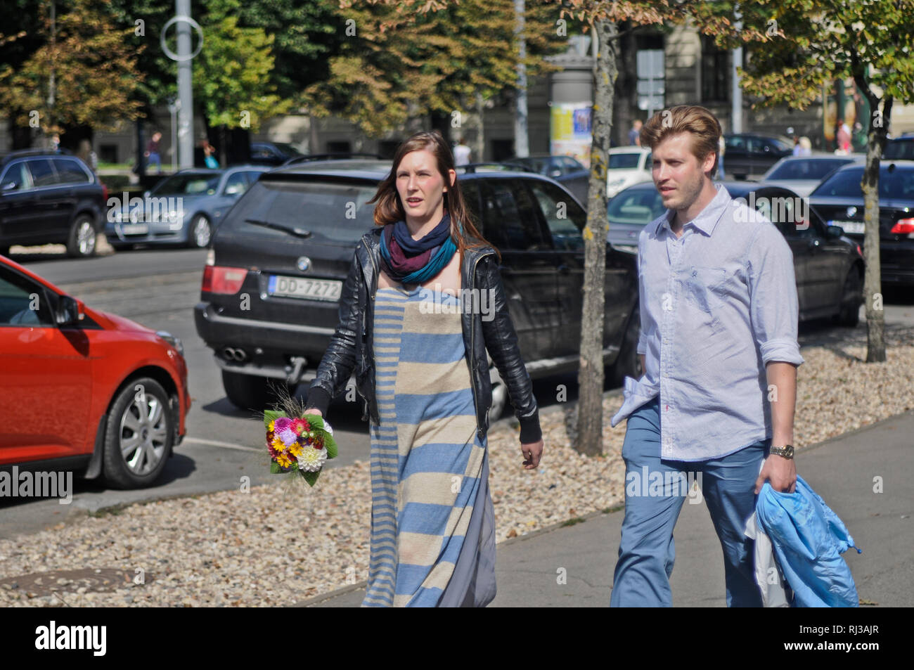 A couple walking togheter in Riga city center, Latvia Stock Photo