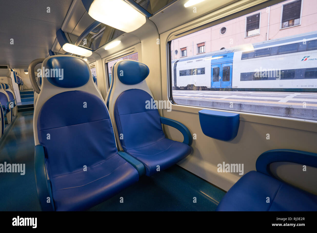 VENICE, ITALY - SEPTEMBER 12, 2014: inside of  Trenitalia train. Trenitalia is the primary train operator in Italy Stock Photo