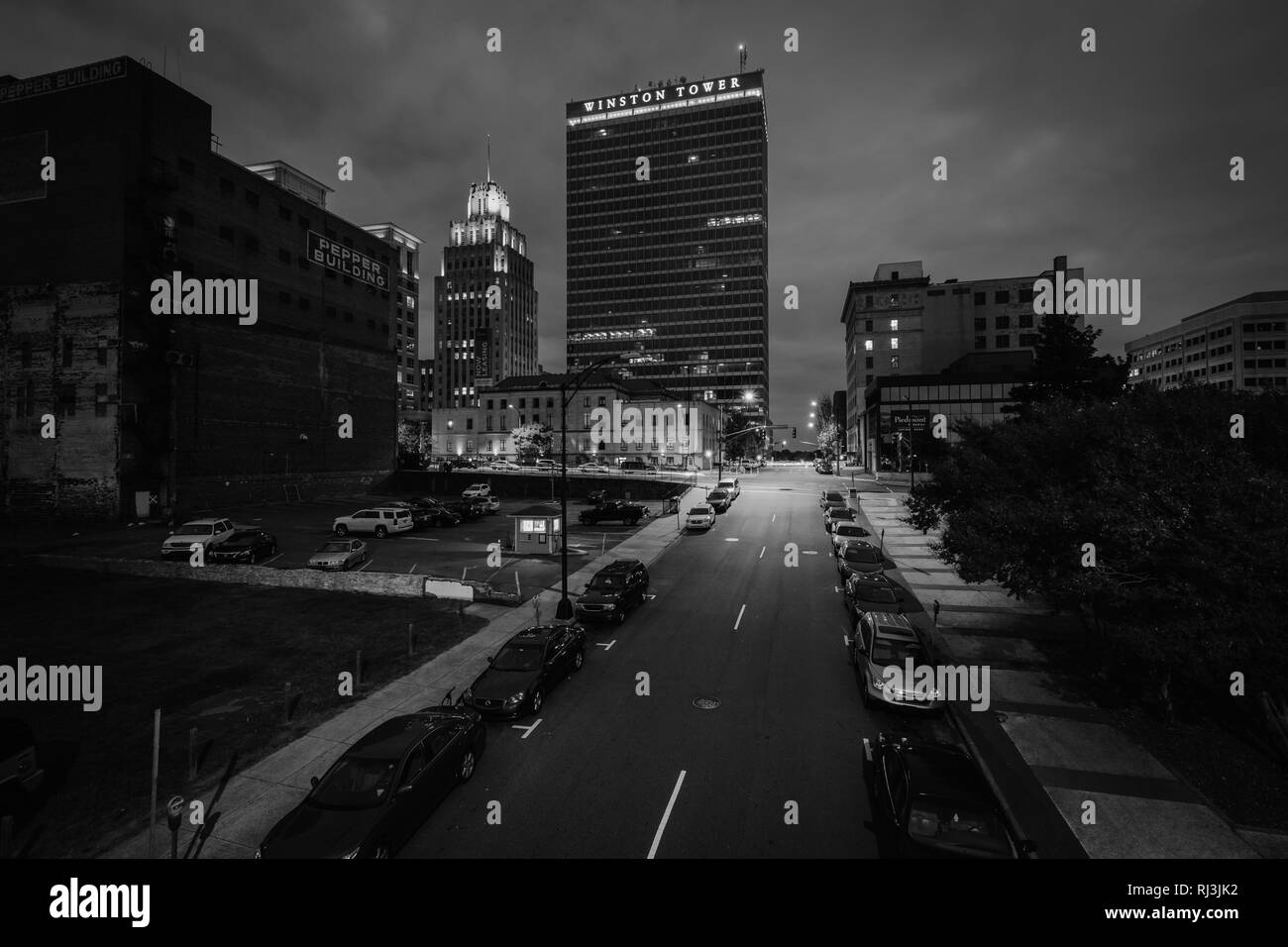 3rd Street and buildings at night, in downtown Winston-Salem, North Carolina. Stock Photo
