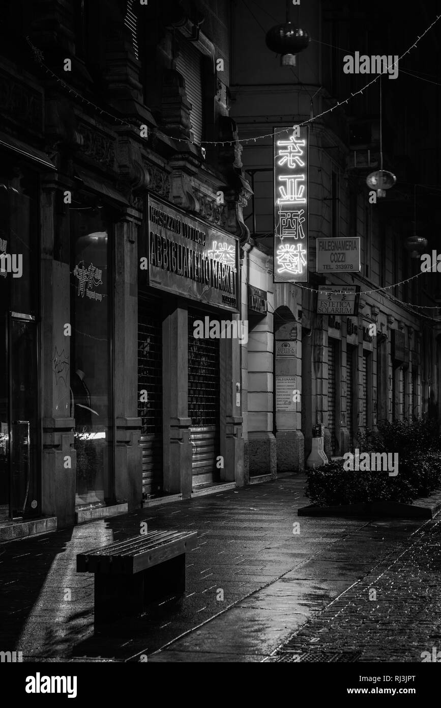 A red sign at night in Chinatown, Milan, Italy Stock Photo