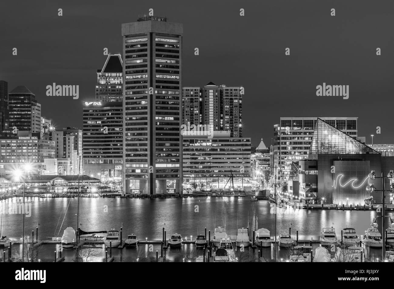 View of the Inner Harbor skyline at night, from Federal Hill Park, in Baltimore, Maryland. Stock Photo