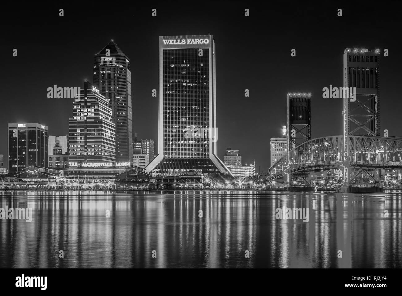 The skyline reflecting in the St. John's River at night in Jacksonvile, Florida. Stock Photo