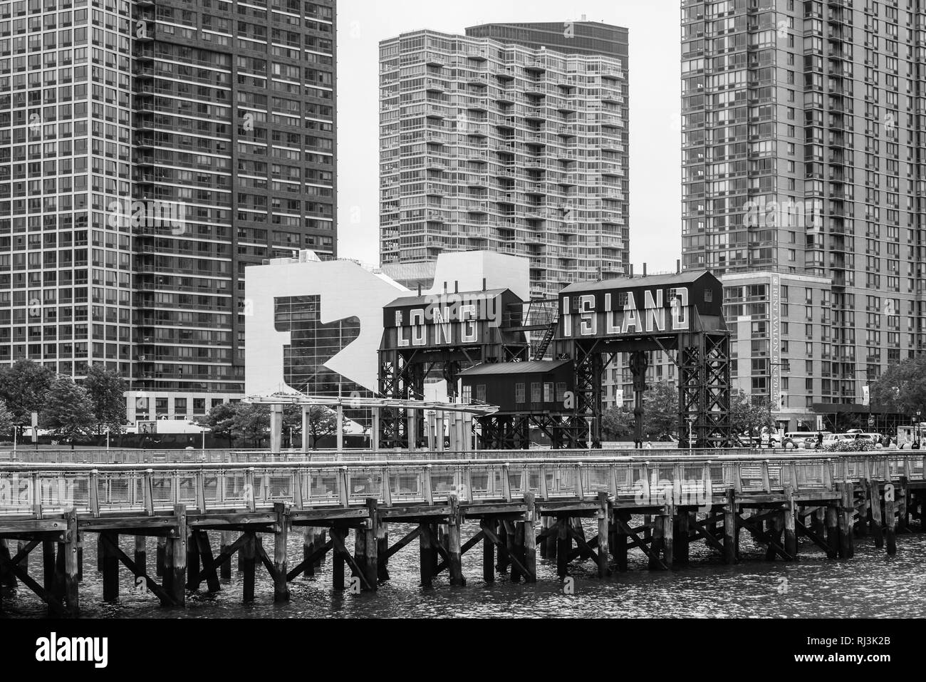 Long Island sign and modern buildings at Gantry Plaza State Park, in