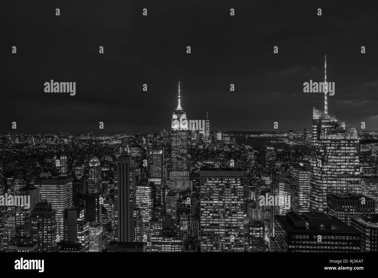 The Empire State Building and Midtown Manhattan skyline at night, in