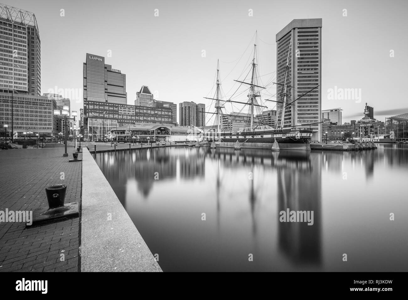 The Baltimore skyline and USS Constellation, at the Inner Harbor, in Baltimore, Maryland. Stock Photo