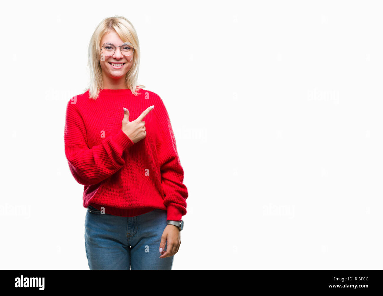 Young beautiful blonde woman wearing sweater and glasses over isolated background cheerful with a smile of face pointing with hand and finger up to th Stock Photo