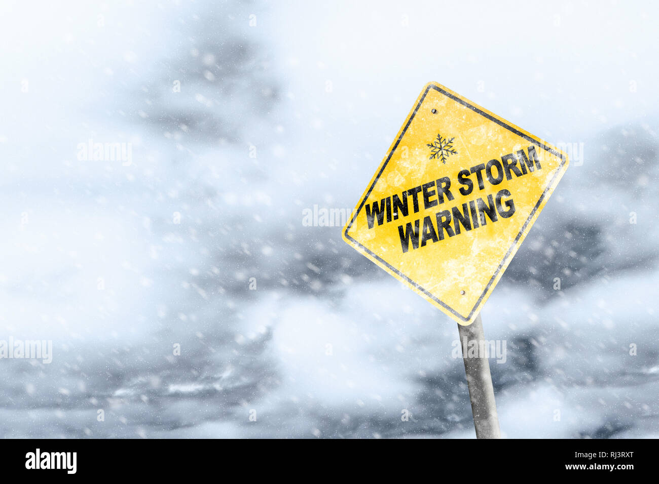Winter storm season with snowflake symbol sign against a snowy background and copy space. Snow splattered and angled sign adds to the drama. Stock Photo