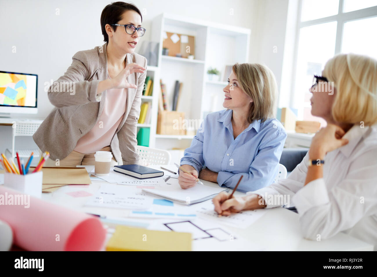 Group of Designers Collaborating Stock Photo