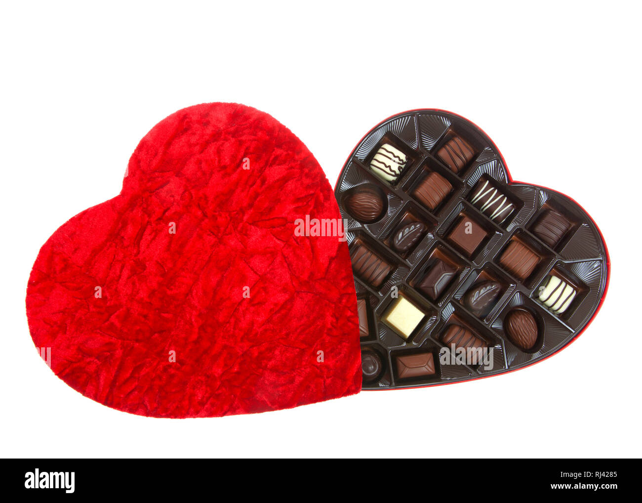 Heart shaped box with chocolate candies isolated on white background. A  popular gift for Valentine's Day Stock Photo - Alamy