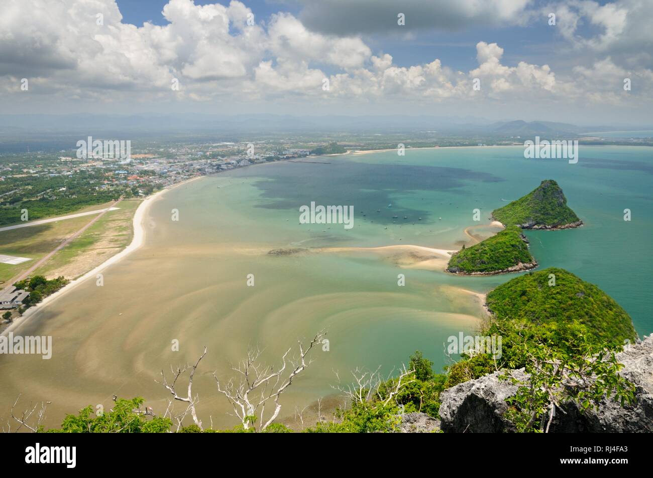 Aerial view of Wing 5 Royal Thai Air Force base, small uninhabited islands in Prachuap bay and Prachuap town from Kao Lom Muak mountain in Thailand Stock Photo