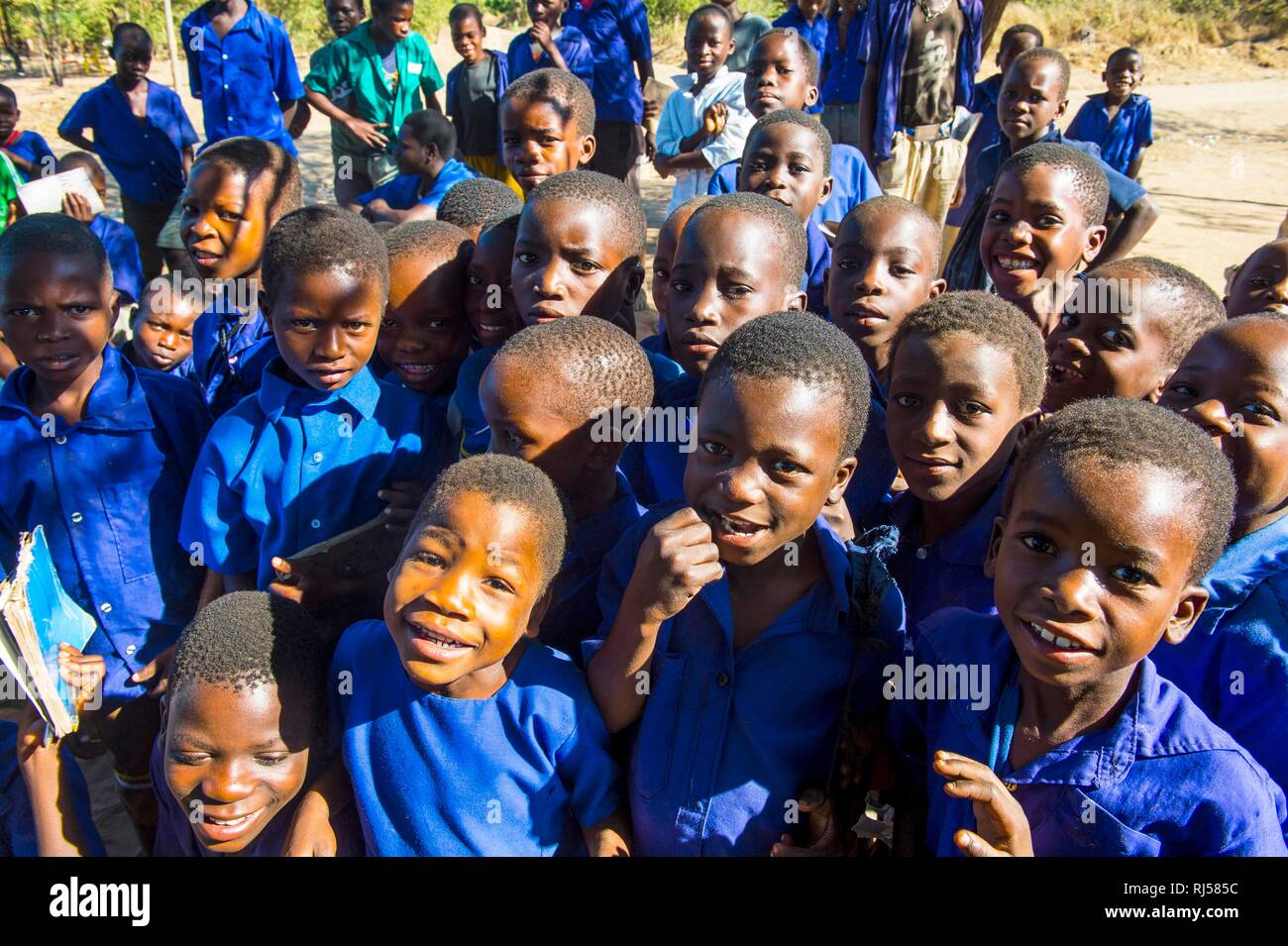 Many children, pupils in class uniform, Liwonde National Park, Malawi Stock Photo