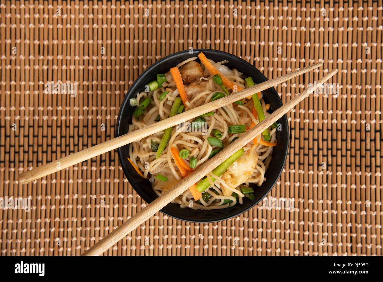 Garlic Noodles with chopsticks, top view, Pune, India Stock Photo Alamy