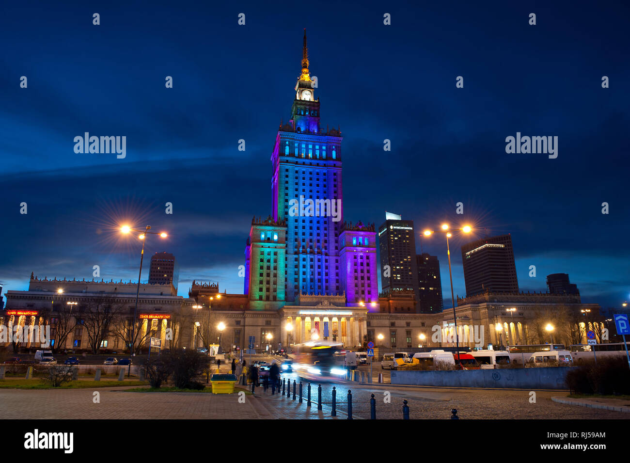 Palace of Culture and Science in rainbow colors, Palac Kultury i Nauki, PKiN, in central Warsaw, Poland, Dec, 2013, Stock Photo