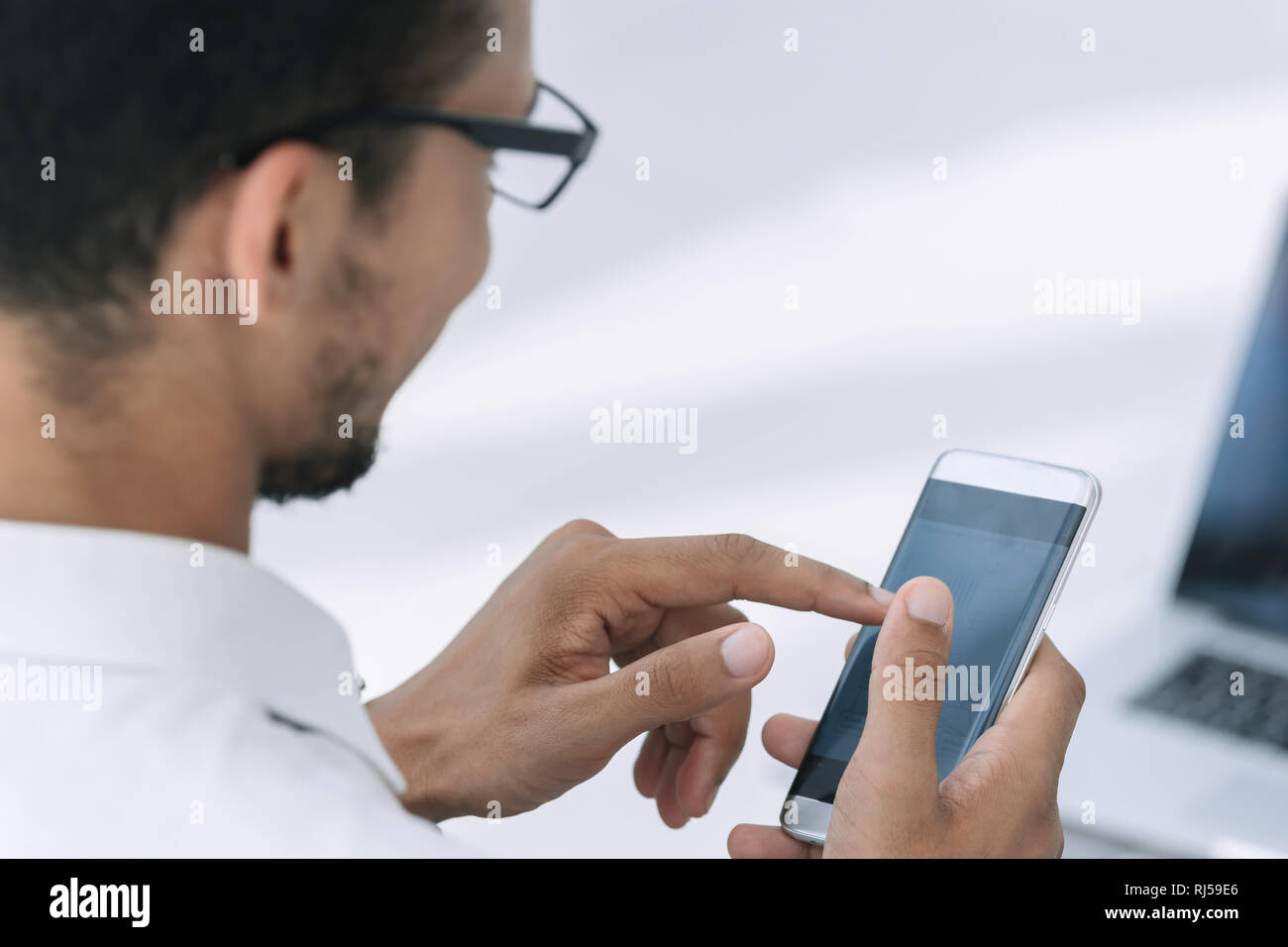 close up. business men using a modern smartphone Stock Photo