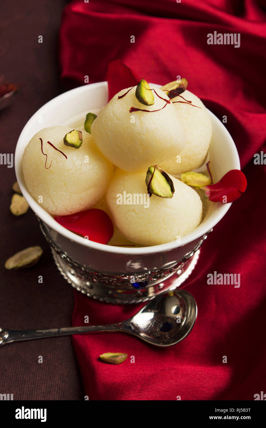 A bowl full with typical Indian sweet rasgulla, Pune, India Stock Photo