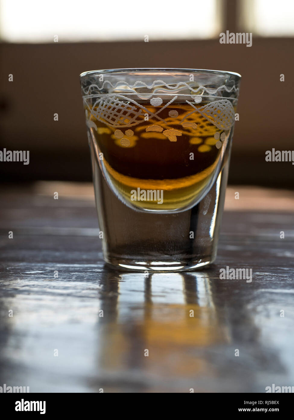 glass of Fortress rum Stock Photo Alamy