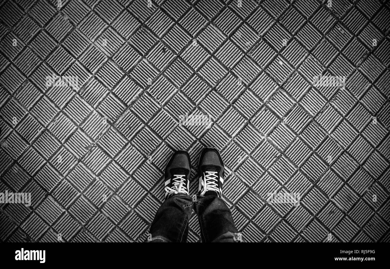 Feet with boots, urban fashion detail Stock Photo Alamy