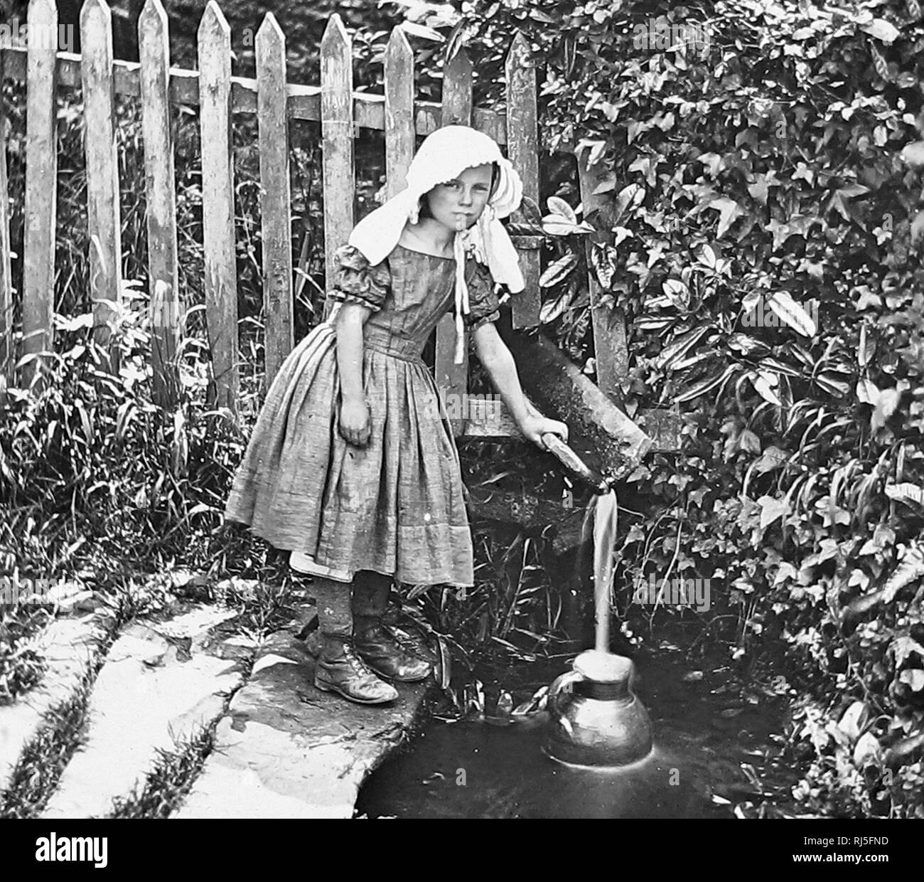 girl-fetching-water-from-the-well-stock-photo-alamy