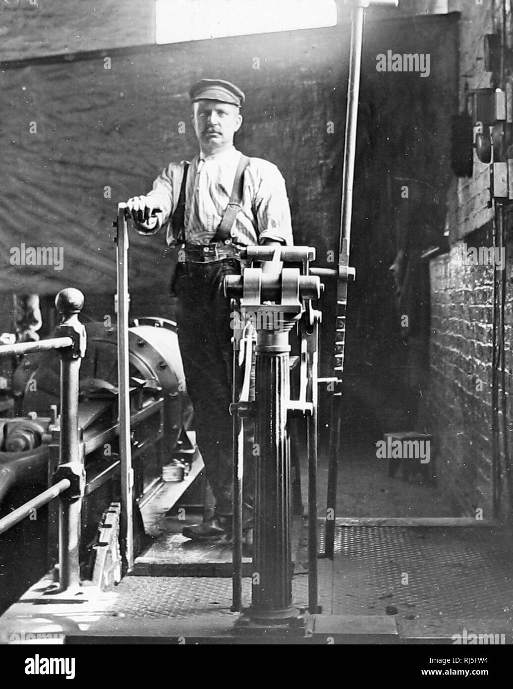 Driving a coal mine lift engine Stock Photo