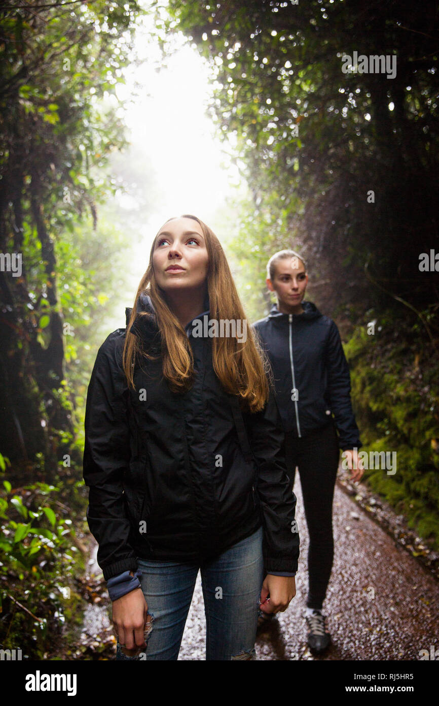 Two young women in park Stock Photo - Alamy