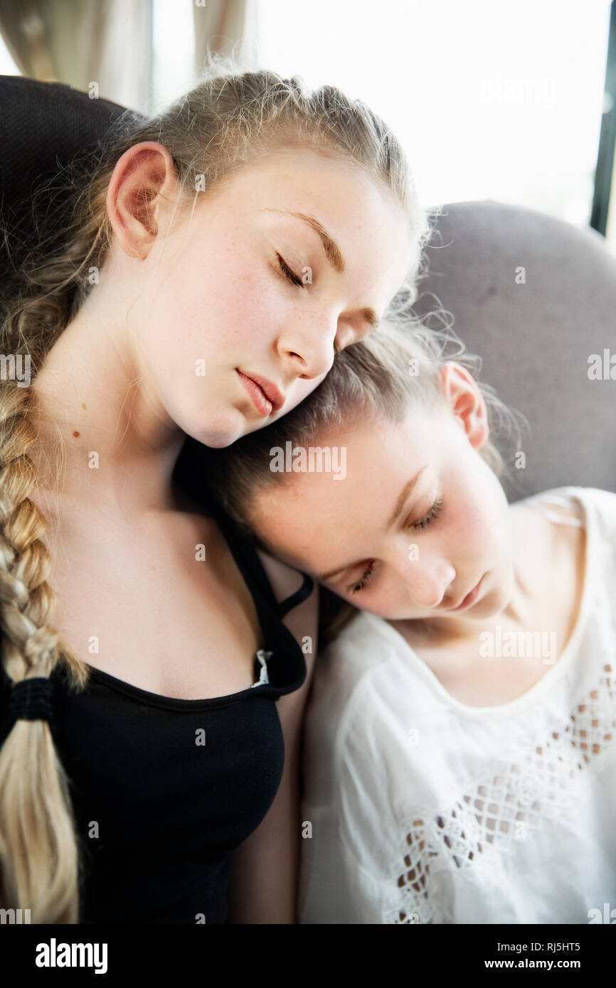 Sisters sleeping side by side Stock Photo - Alamy