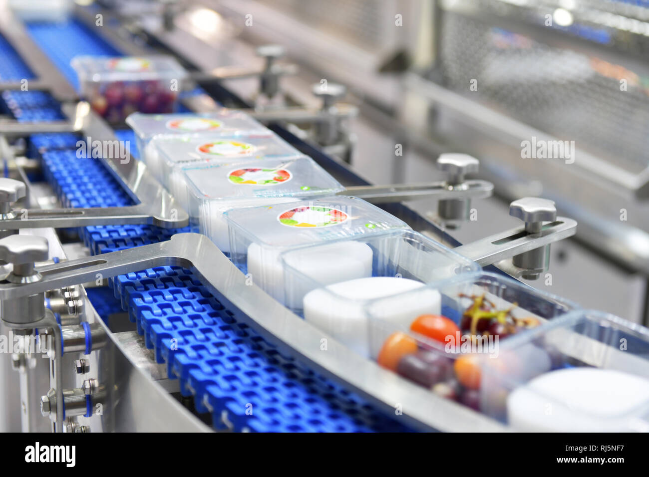 Food products boxs transfer on Automated conveyor systems industrial automation for package Stock Photo