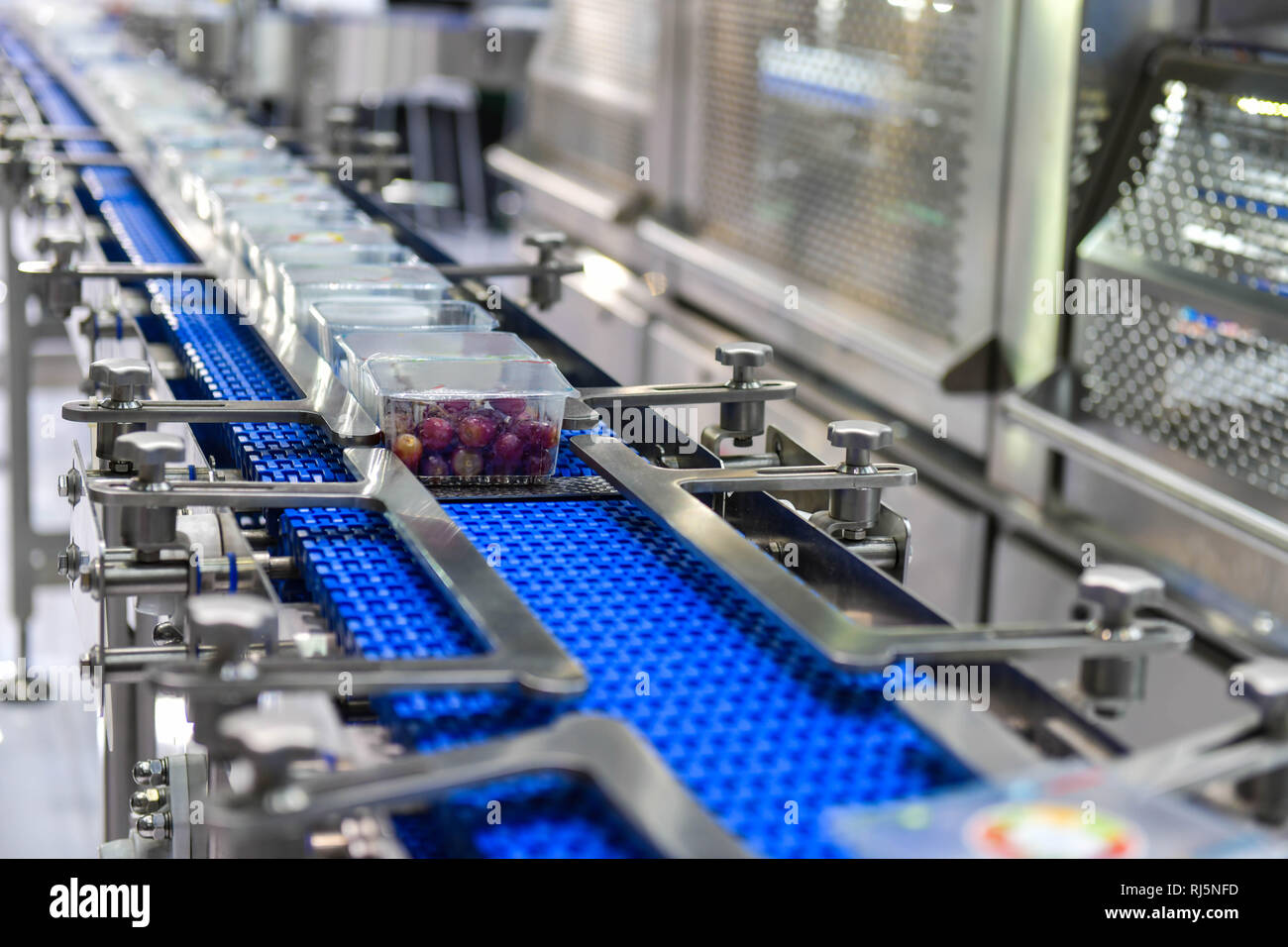 Food products boxs transfer on Automated conveyor systems industrial automation for package Stock Photo