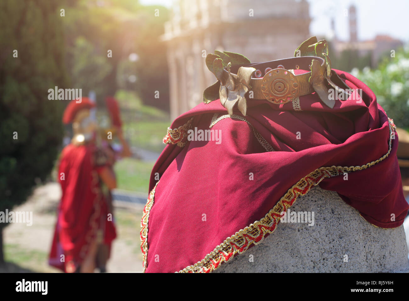 Roman soldiers legionaries clothes on Rome ruins background. Stock Photo
