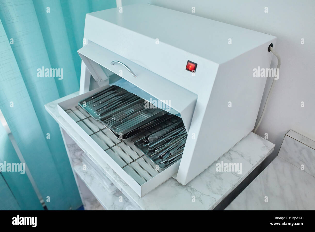 photo of dental tools in sterilizer Stock Photo Alamy