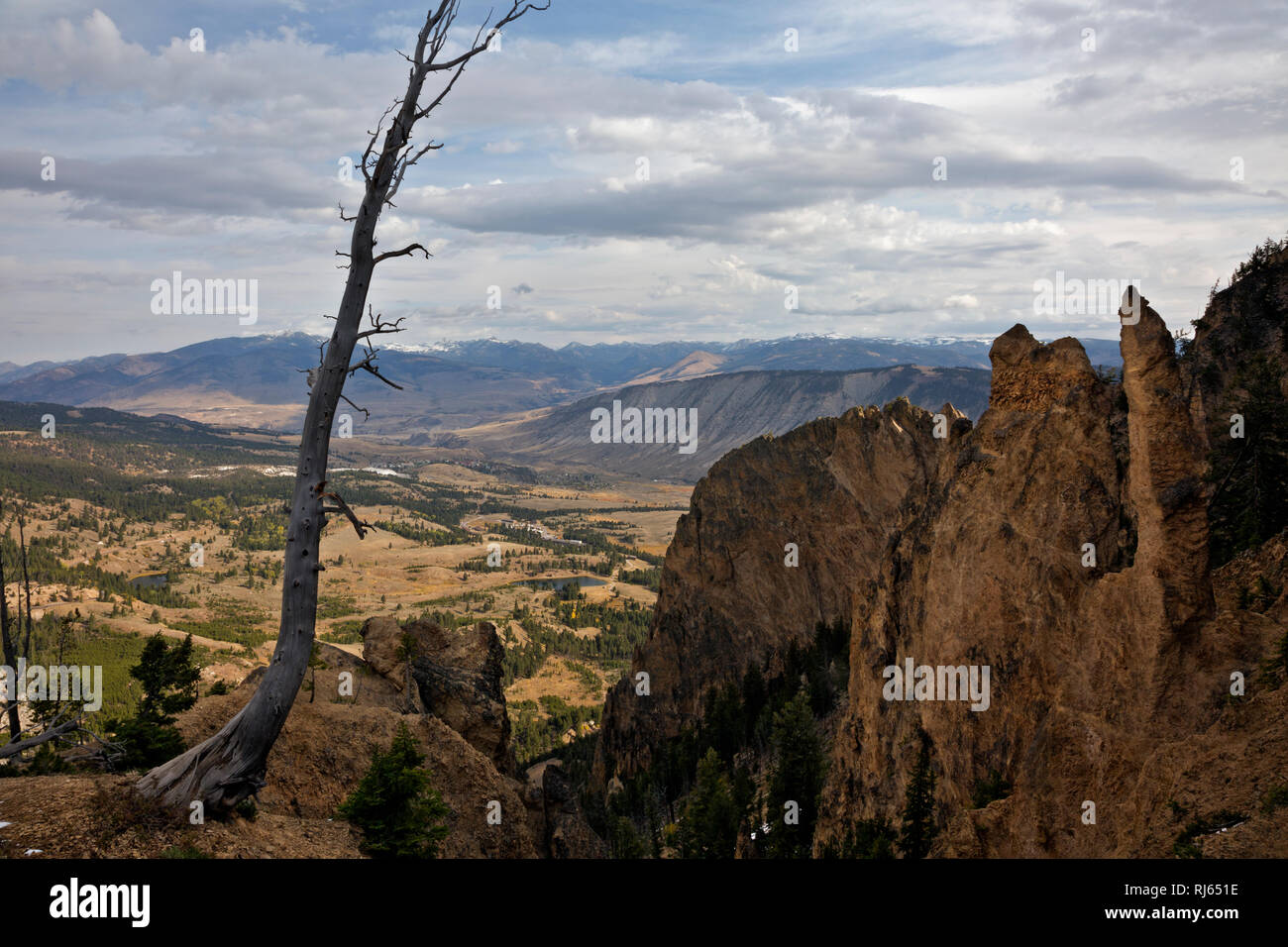 WY03150-00...WYOMING - Colorful cliffs and spires and a view of the Mammoth area seen from the Bunsen Peak Trail in Yellowstone National Park. Stock Photo