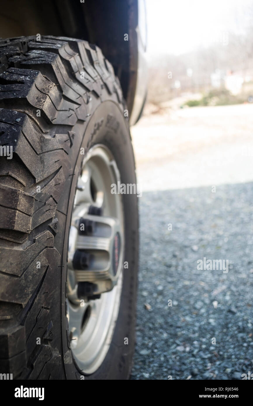AllTerrain Tire on Gravel Road Stock Photo Alamy
