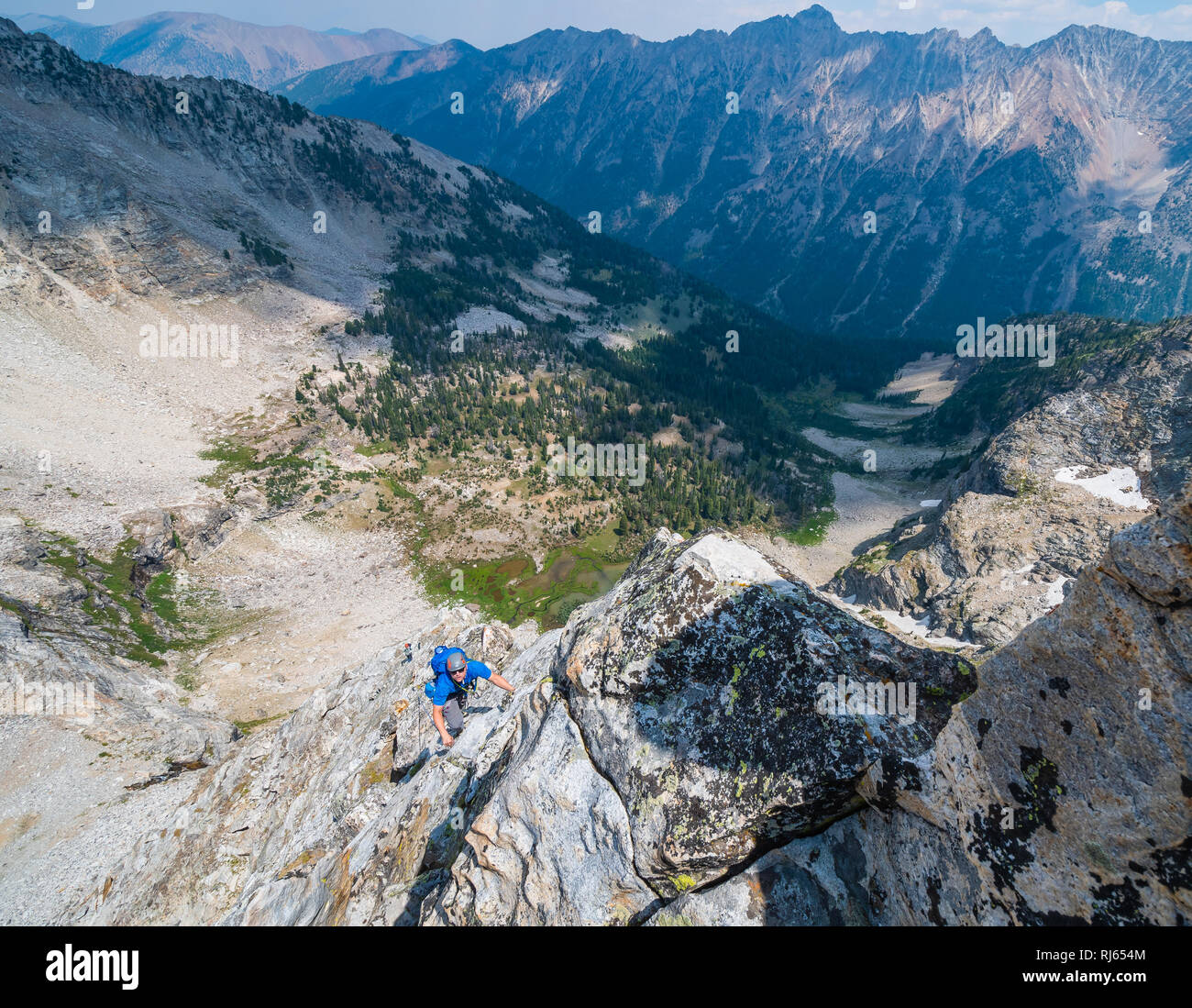Matt Ottaway climbing Sky Pilot 5.7 on Rearing Stallion Peak in the Pioneer Mountain Range Idaho Stock Photo