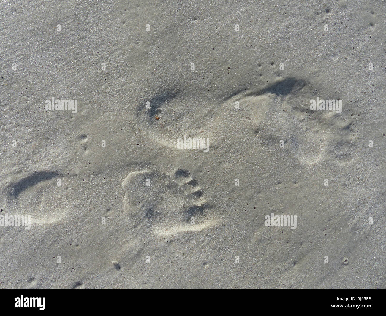 Footprints in sand Stock Photo