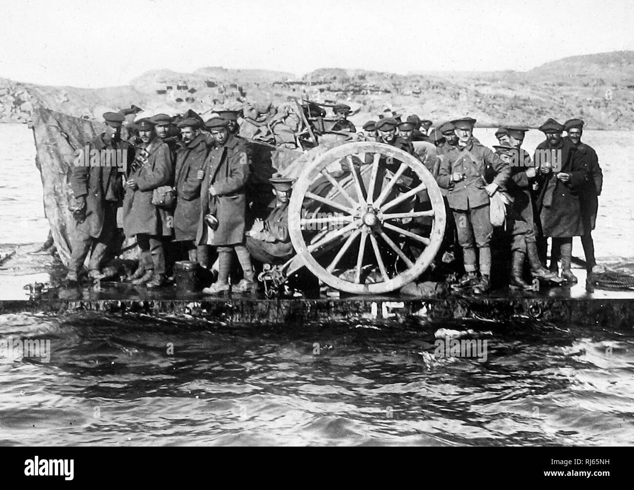 Moving guns by raft during WW1 Stock Photo Alamy