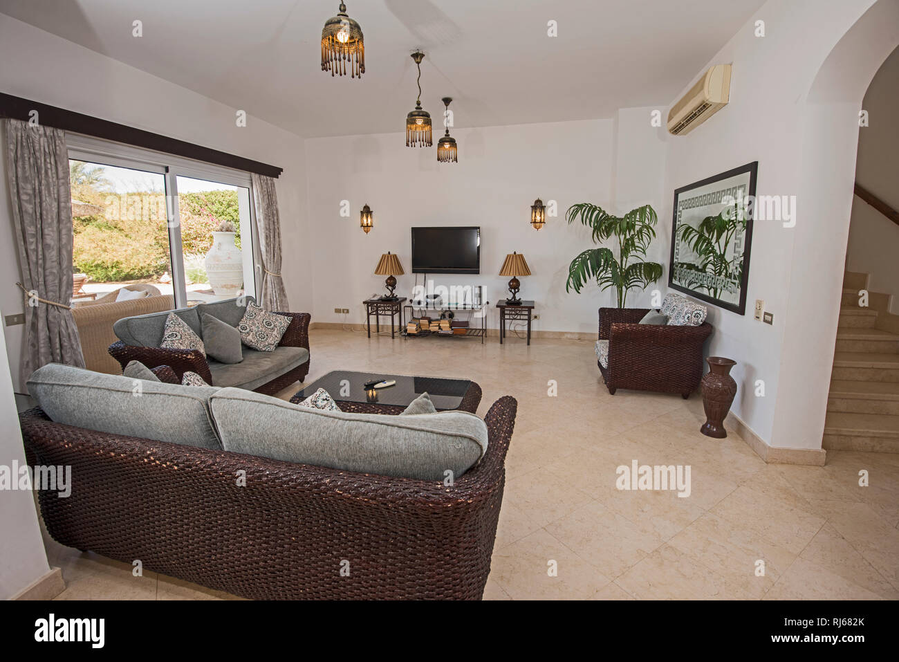 Living room lounge in luxury holiday villa show home showing interior ...